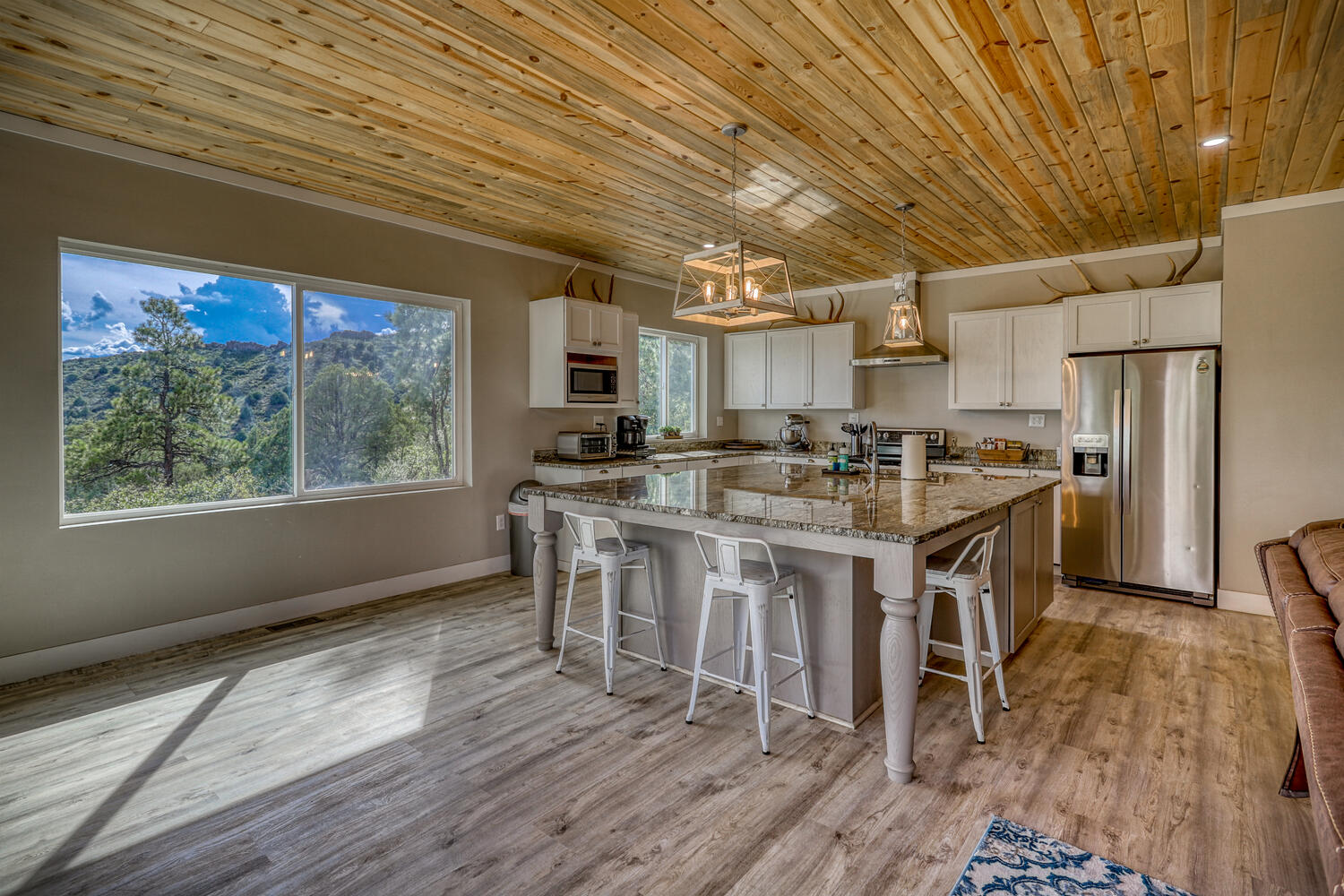 Kitchen in vacation rental with great mountain views by A River Runs Thru It