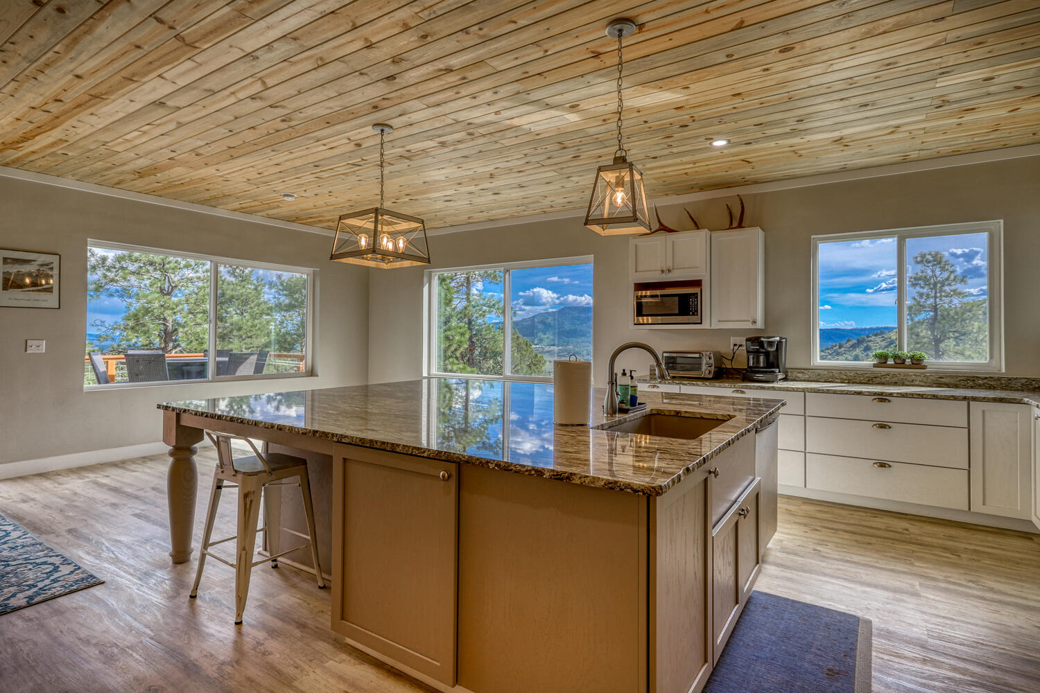 Kitchen in vacation rental with great mountain views by A River Runs Thru It