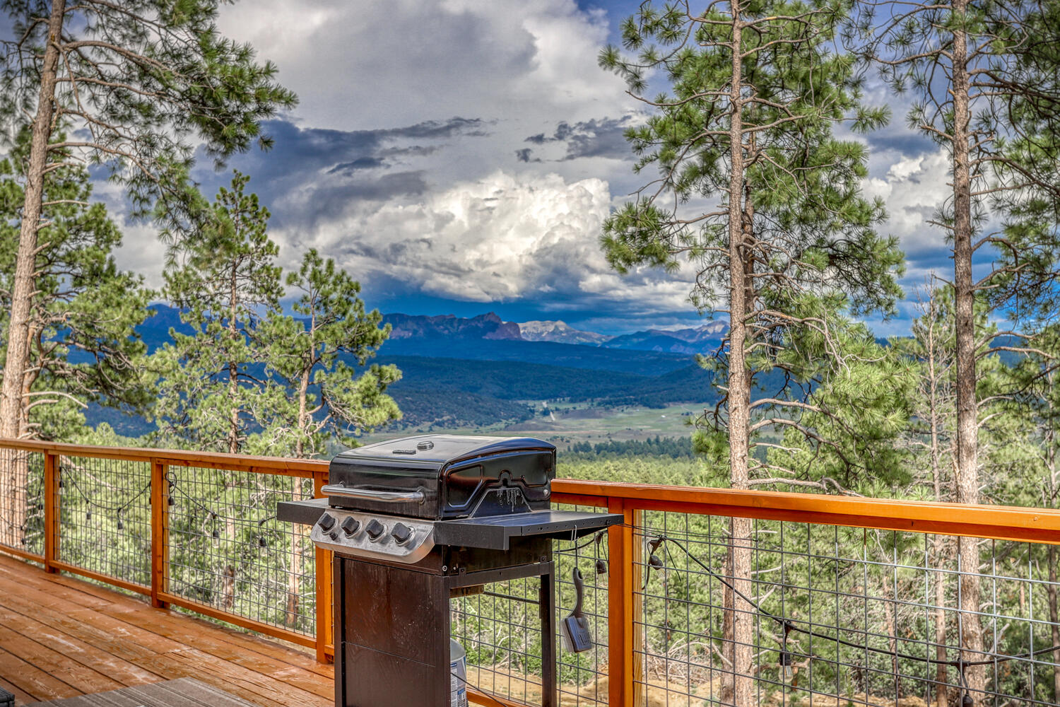 Back patio with great mountain views in Pagosa Springs by A River Runs Thru It