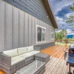 Back patio with great mountain views in Pagosa Springs by A River Runs Thru It