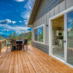 Back patio with great mountain views in Pagosa Springs by A River Runs Thru It
