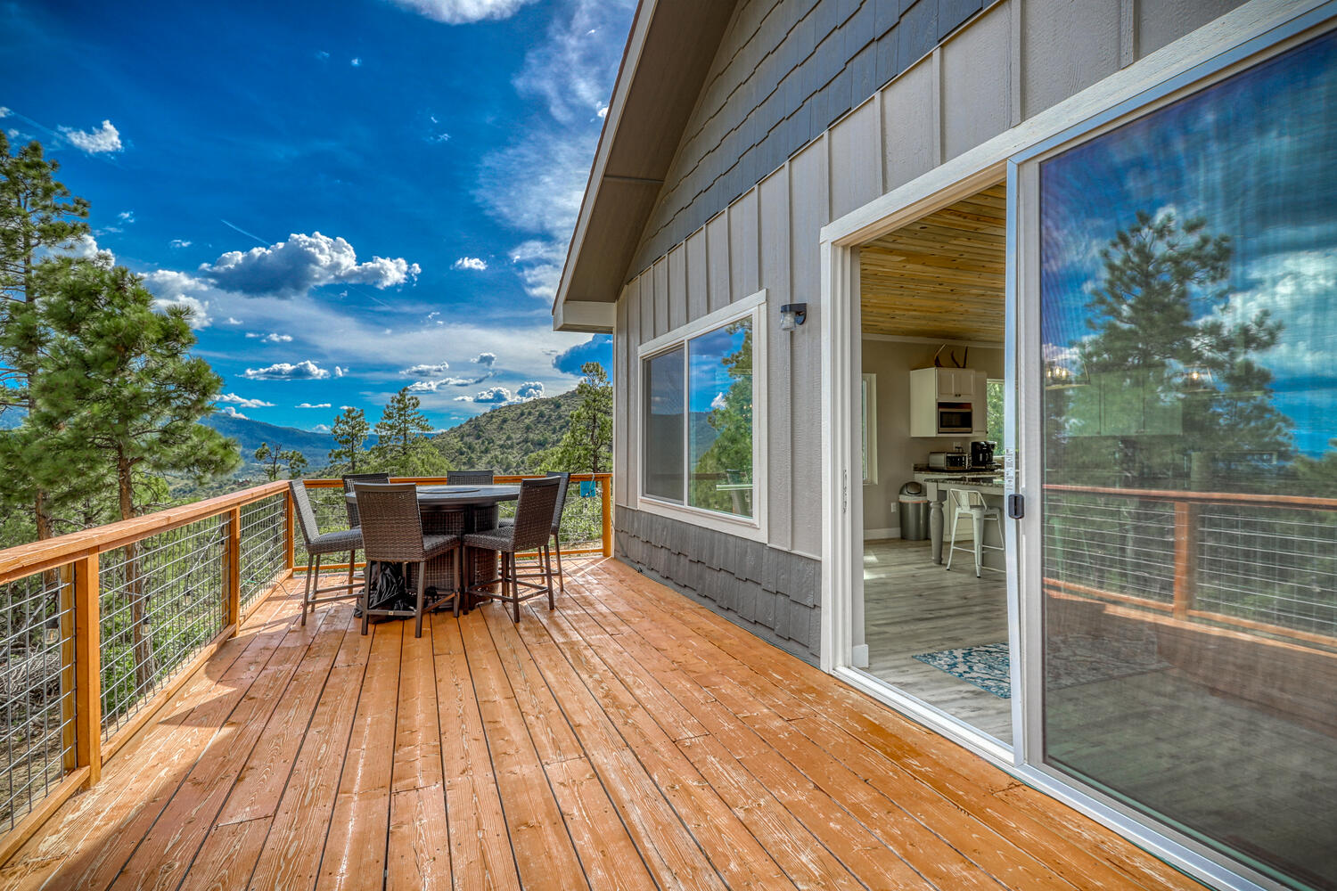 Back patio with great mountain views in Pagosa Springs by A River Runs Thru It
