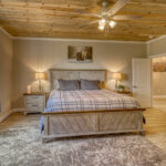 Master bedroom in vacation rental with great mountain views by A River Runs Thru It