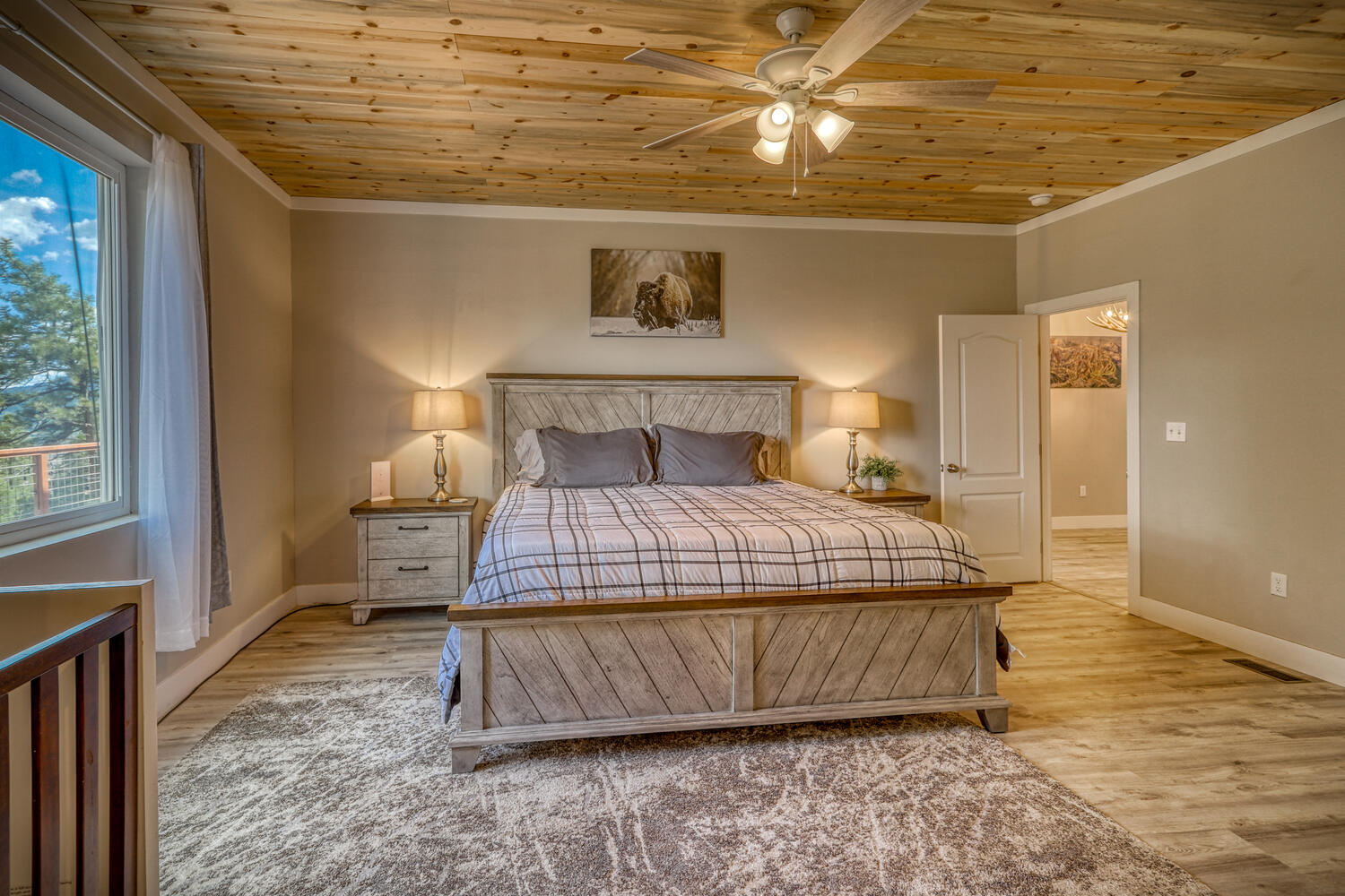 Master bedroom in vacation rental with great mountain views by A River Runs Thru It
