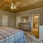 Master bedroom in vacation rental with great mountain views by A River Runs Thru It