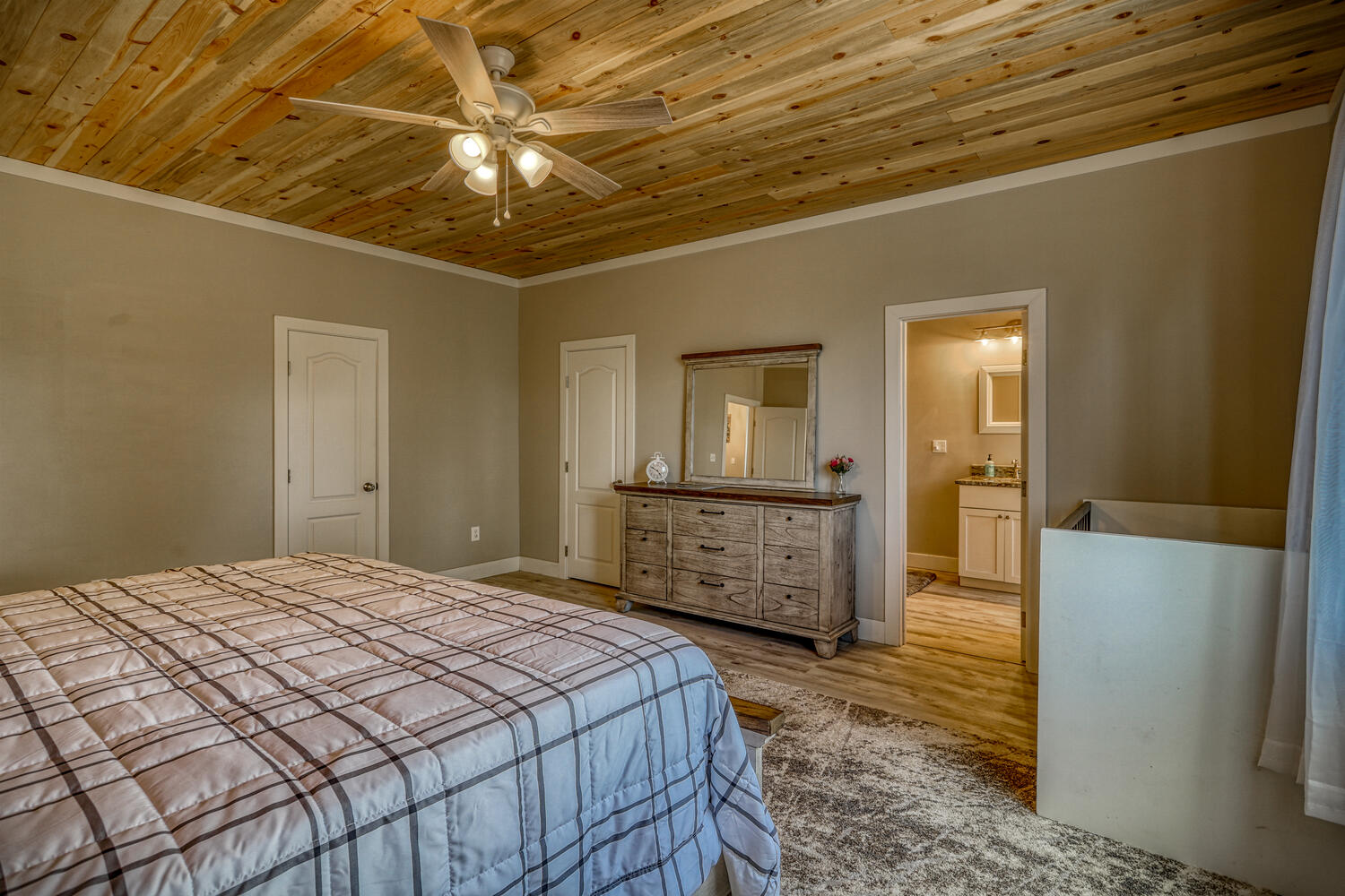 Master bedroom in vacation rental with great mountain views by A River Runs Thru It