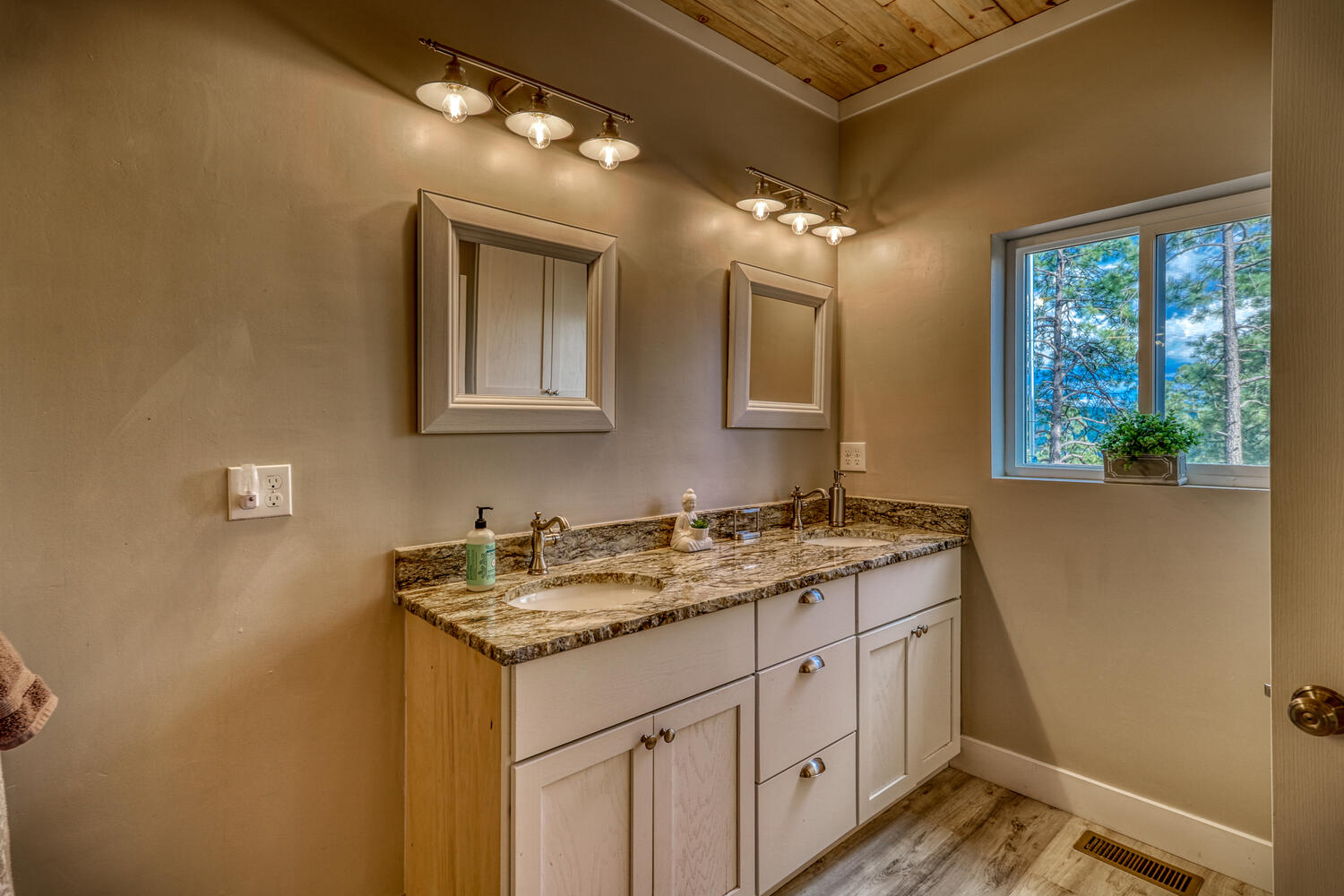 Master bathroom in vacation rental with great mountain views by A River Runs Thru It