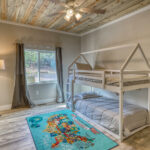 Bunk room in vacation rental with great mountain views by A River Runs Thru It