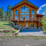 Outside view of Eagle's View vacation rental home on 4 acres by A River Runs Thru It