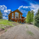 Outside view of Eagle's View vacation rental home on 4 acres by A River Runs Thru It