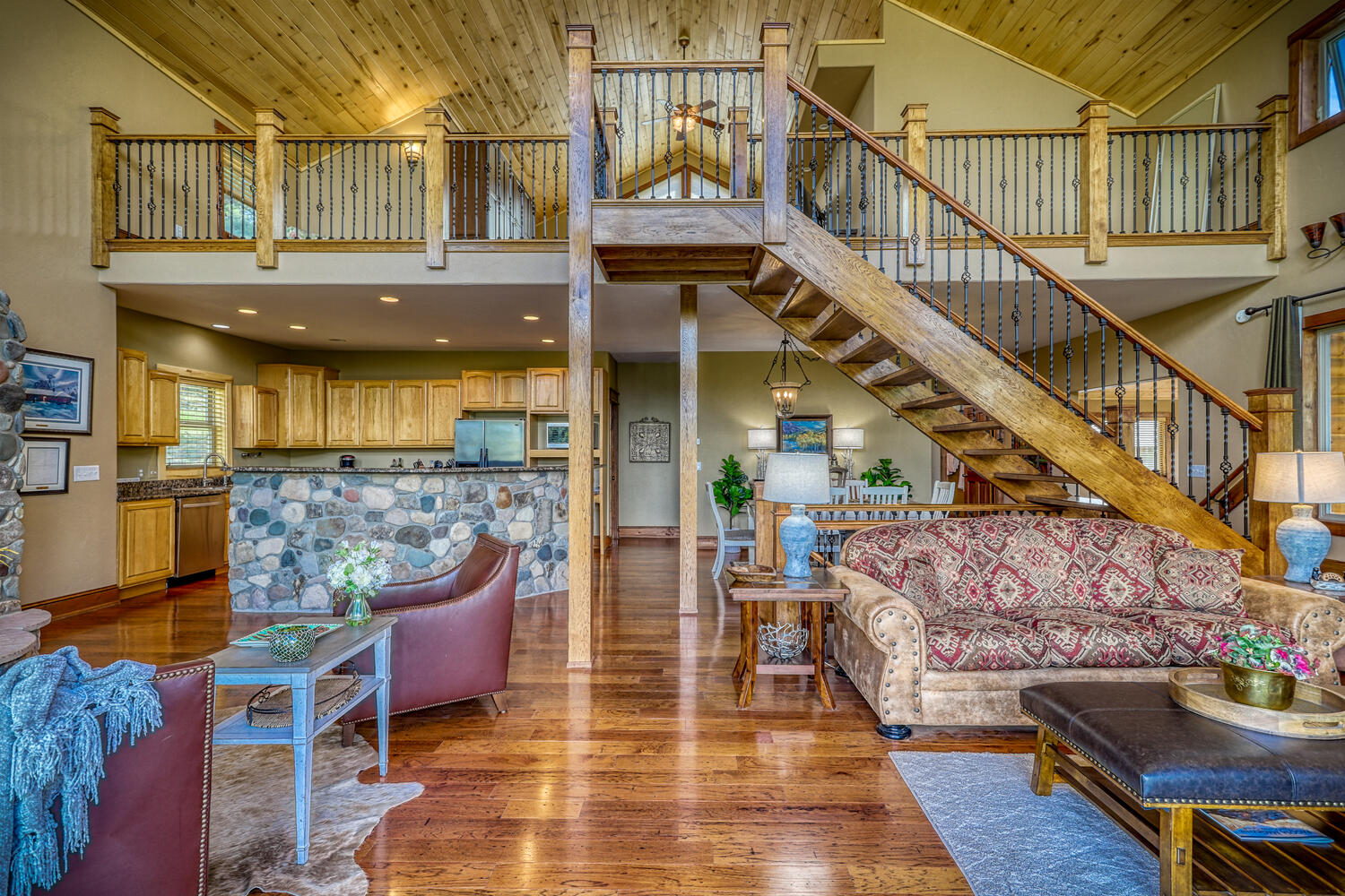 Main living room and loft of Eagle's View vacation rental home by A River Runs Thru It