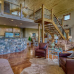 Main living area, showing kitchen and loft areas of Eagle's View vacation rental home by A River Runs Thru It
