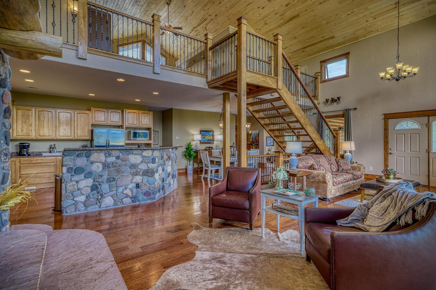 Main living area, showing kitchen and loft areas of Eagle's View vacation rental home by A River Runs Thru It