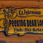 Peeking Bear Lodge is a vacation rental home in San Juan River Village in Pagosa Springs, CO